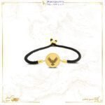 اسوارة مع قطعة ذهب دائريه 2.5جرام شعار النسر عيار 24 قيراط